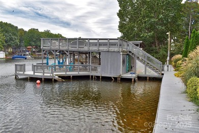 This waterfront home is located off Badin Lake's main channel - photo 9