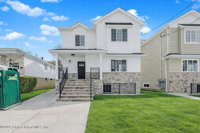 NEW CONSTRUCTION! Beautiful oversized TWO family 6/6 built with - photo 1
