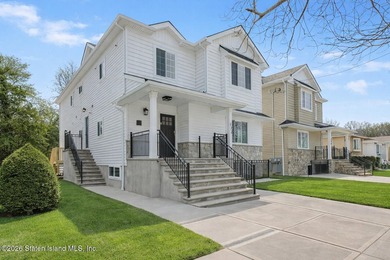 NEW CONSTRUCTION! Beautiful oversized TWO family 6/6 built with - photo 2