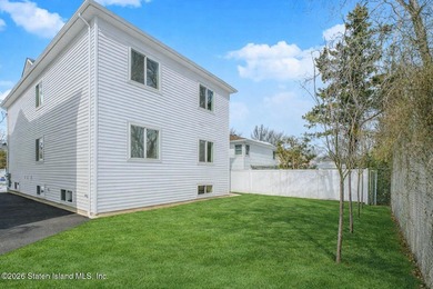 NEW CONSTRUCTION! Beautiful oversized TWO family 6/6 built with - photo 3