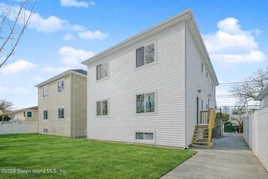 NEW CONSTRUCTION! Beautiful oversized TWO family 6/6 built with - photo 4