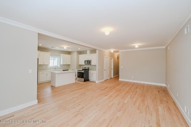 NEW CONSTRUCTION! Beautiful oversized TWO family 6/6 built with - photo 7