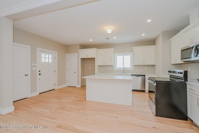 NEW CONSTRUCTION! Beautiful oversized TWO family 6/6 built with - photo 9