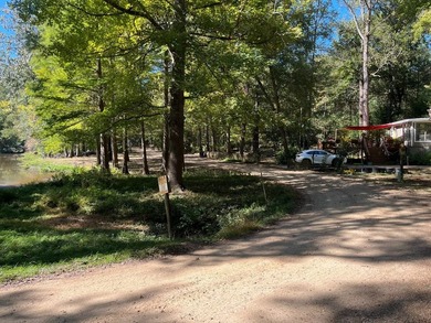 Discover peaceful lake living with this charming and - photo 2
