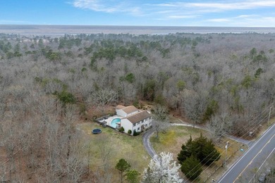 Tucked away on just under 7 ACRES of private, undisturbed wooded - photo 4