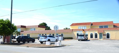 This unit boasts six separate offices plus a bathroom and a file - photo 4