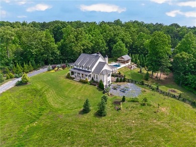 Nestled on 4.11 meticulously manicured private acres, this - photo 2