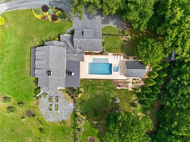 Nestled on 4.11 meticulously manicured private acres, this - photo 3