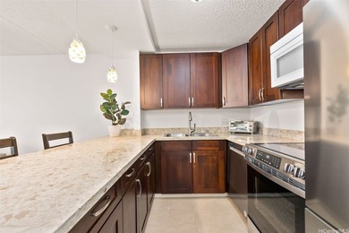 This well-maintained 1-bedroom, 1-bath leasehold unit offers an - photo 5