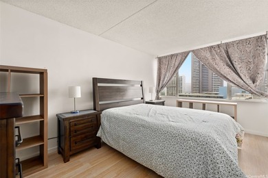 This well-maintained 1-bedroom, 1-bath leasehold unit offers an - photo 6