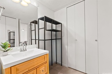 This well-maintained 1-bedroom, 1-bath leasehold unit offers an - photo 7