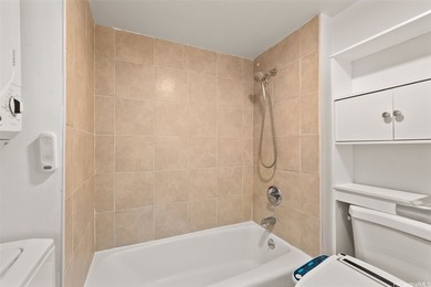 This well-maintained 1-bedroom, 1-bath leasehold unit offers an - photo 8