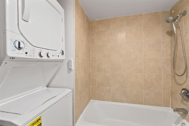 This well-maintained 1-bedroom, 1-bath leasehold unit offers an - photo 9