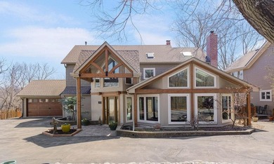 Located on a quiet cul-de-sac, this incredible home is designed - photo 1