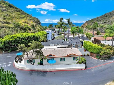 This beautiful 3 bedroom 3 bath beach cottage is complete with - photo 1