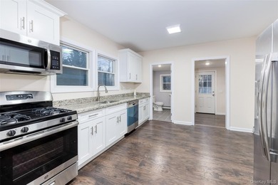Step into this cute and cozy country colonial updated and - photo 5