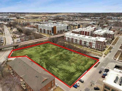 This 1.59 acres of land for redevelopment offering is within the - photo 7