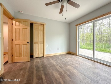 Modern raised ranch nearing completion with Lake George lake - photo 12