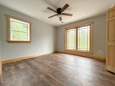 Modern raised ranch nearing completion with Lake George lake - photo 14