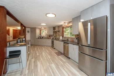 A rare blend of artistic architecture and modern luxury on this - photo 11