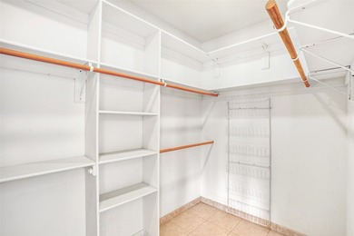 24 Hunter Drive is a pueblo style home in the Vista de Pedernal