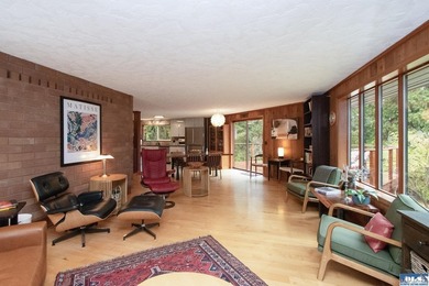 A rare blend of artistic architecture and modern luxury on this - photo 14