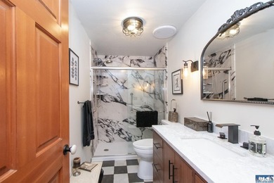 A rare blend of artistic architecture and modern luxury on this - photo 17