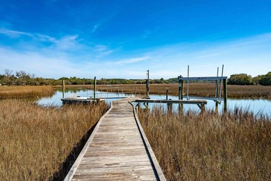 Custom-built waterfront estate on 5.25 private acres with