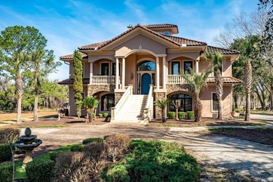 Custom-built waterfront estate on 5.25 private acres with