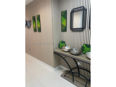 ALINA 220 Residences. This little-under 3,000 square foot condo - photo 3