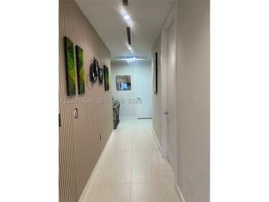 ALINA 220 Residences. This little-under 3,000 square foot condo - photo 4