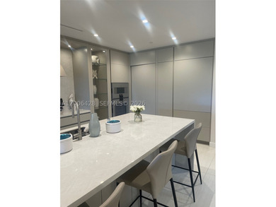 ALINA 220 Residences. This little-under 3,000 square foot condo - photo 5