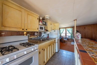 DISCOVER WATERFRONT LIVING IN THE DESIRABLE BUCKEYE KNOLL &