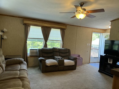 Nestled on a peaceful one-acre parcel in scenic Long Lake, this - photo 3