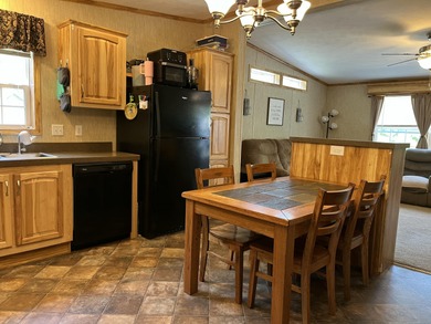 Nestled on a peaceful one-acre parcel in scenic Long Lake, this - photo 8