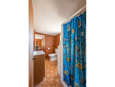 DISCOVER WATERFRONT LIVING IN THE DESIRABLE BUCKEYE KNOLL &