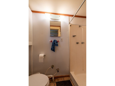 DISCOVER WATERFRONT LIVING IN THE DESIRABLE BUCKEYE KNOLL &