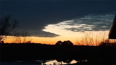 DISCOVER WATERFRONT LIVING IN THE DESIRABLE BUCKEYE KNOLL &