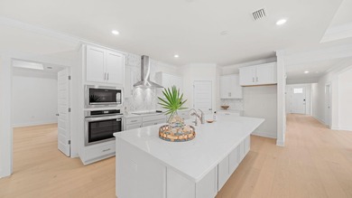 Situated on nearly three-quarters of an acre, this exceptional - photo 7
