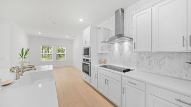 Situated on nearly three-quarters of an acre, this exceptional - photo 8