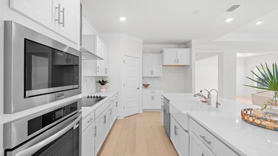 Situated on nearly three-quarters of an acre, this exceptional - photo 9