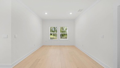 Situated on nearly three-quarters of an acre, this exceptional - photo 10