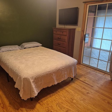 Charming cedar sided home with inground pool and 2 garages. The - photo 12