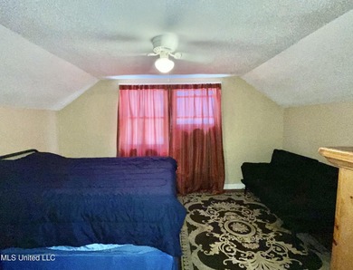 This charming home is a spacious five-bedroom, two full bath - photo 19