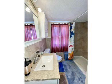 This charming home is a spacious five-bedroom, two full bath - photo 22
