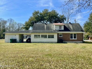This charming home is a spacious five-bedroom, two full bath - photo 34