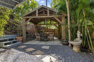 Shut the world out behind the gates of this renovated - photo 2