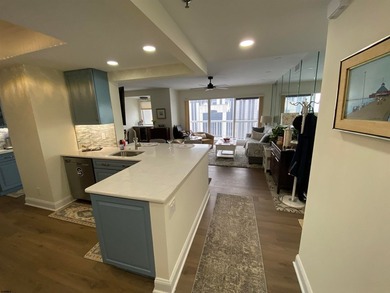 Set high above the Boardwalk at OCEAN CLUB Condominiums, this - photo 6
