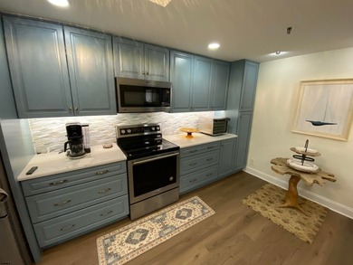 Set high above the Boardwalk at OCEAN CLUB Condominiums, this - photo 7