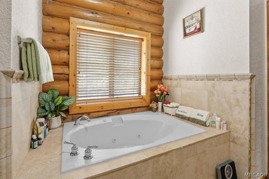 Discover the exceptional craftsmanship of this stunning log home - photo 23